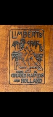 
Charles Limbert branded signature under the bottom of the chair.